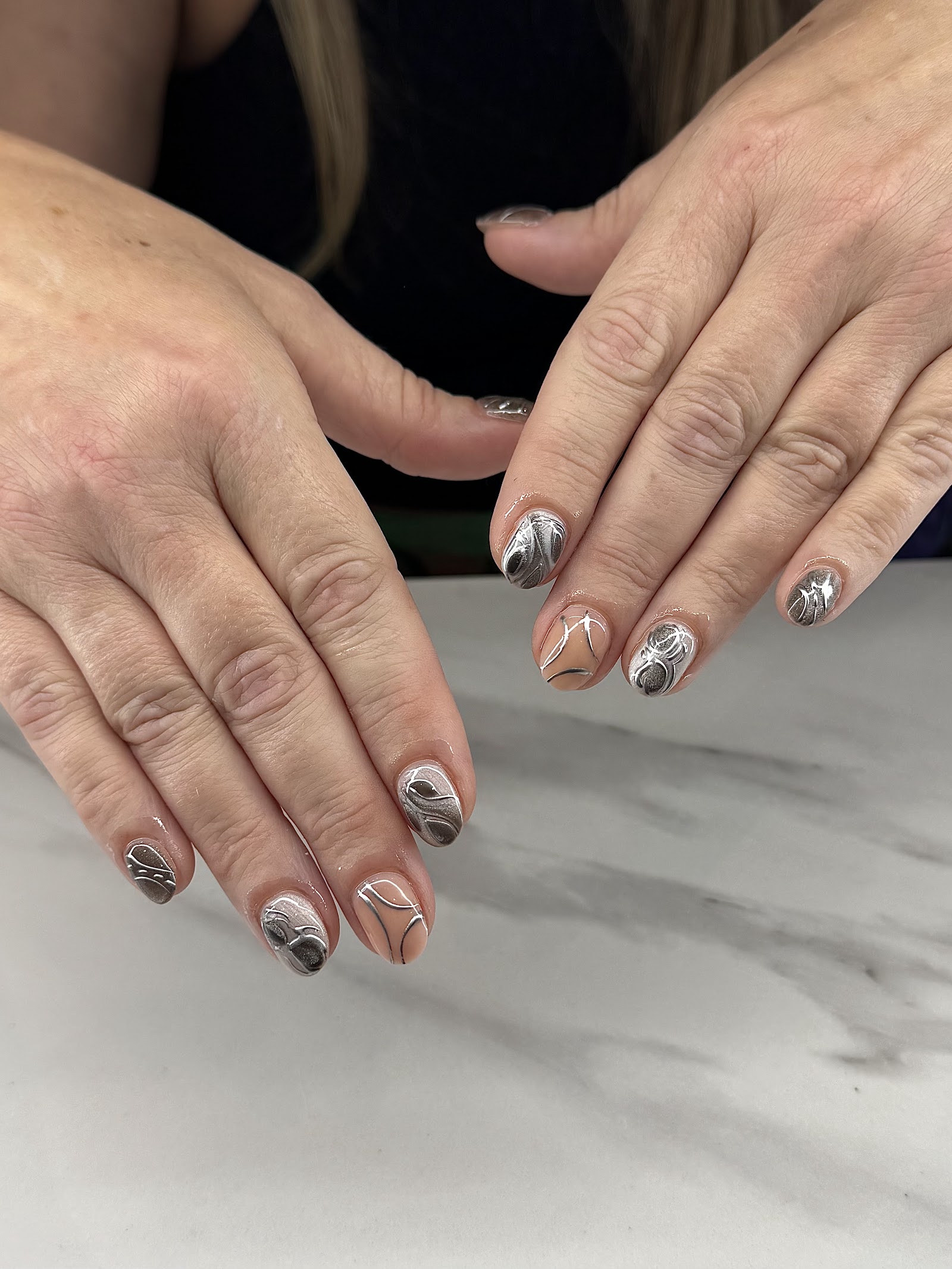 A Perfect 10 Nails & Spa logo